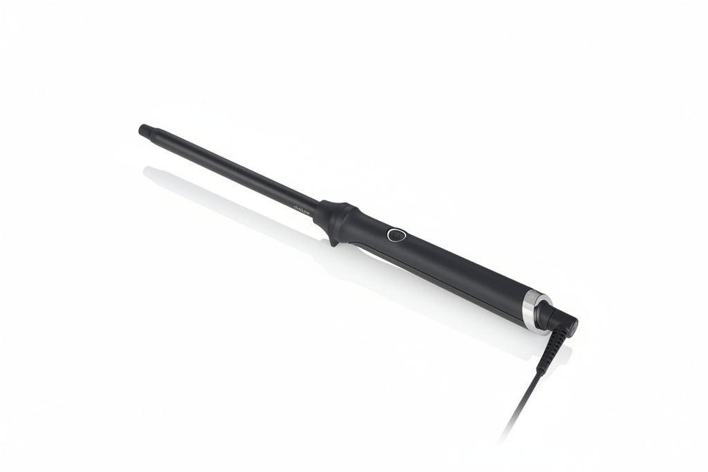 Black curling iron on a white background