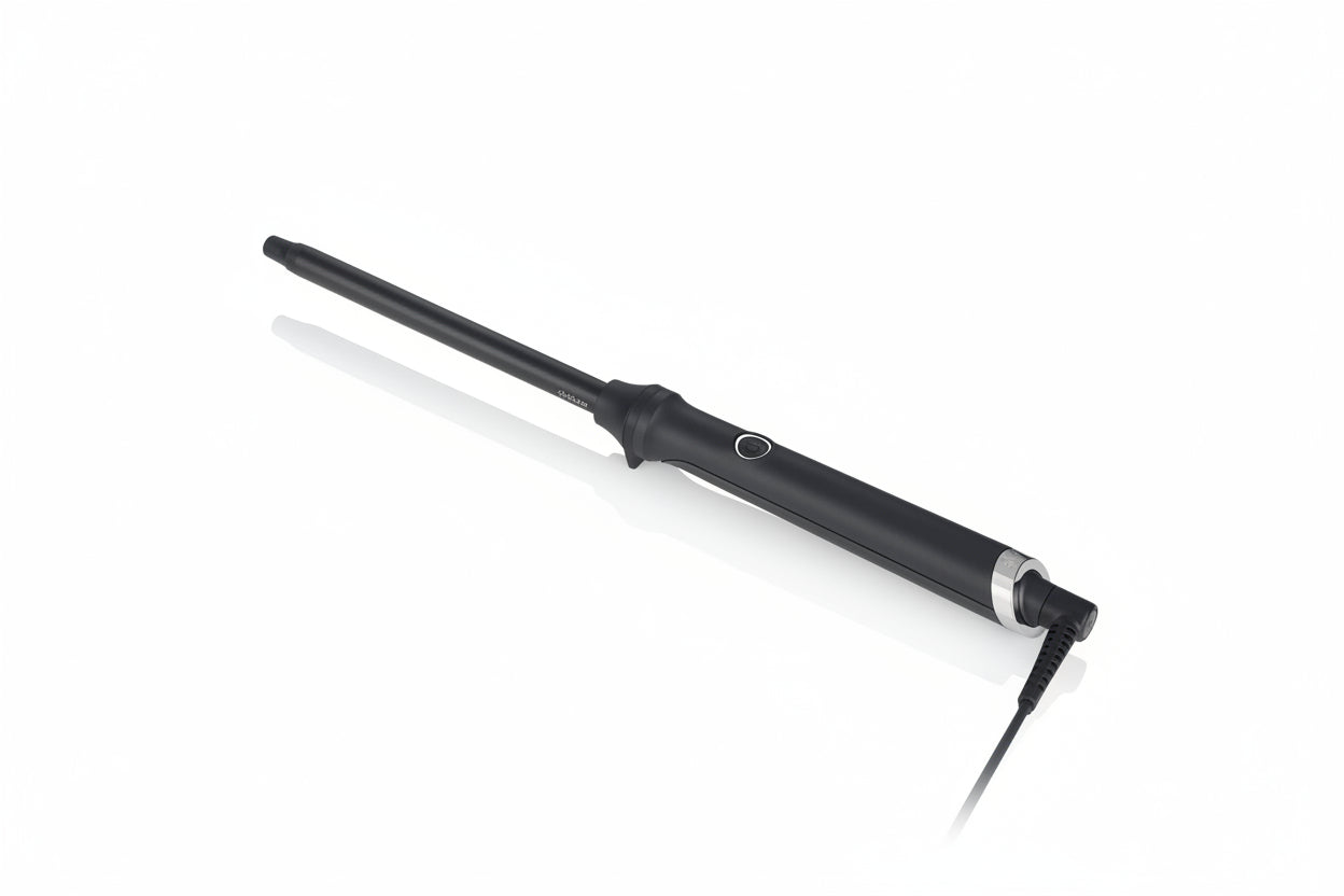 Black curling iron on a white background