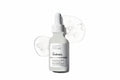 Skincare serum bottle with dropper labeled 'The Ordinary' on a white background