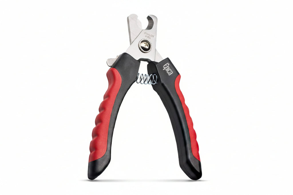 Pet nail clippers with red and black handles on a white background