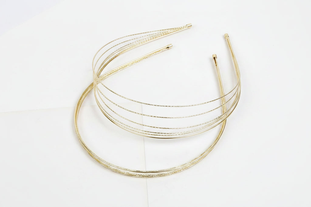 Gold headband on a white background