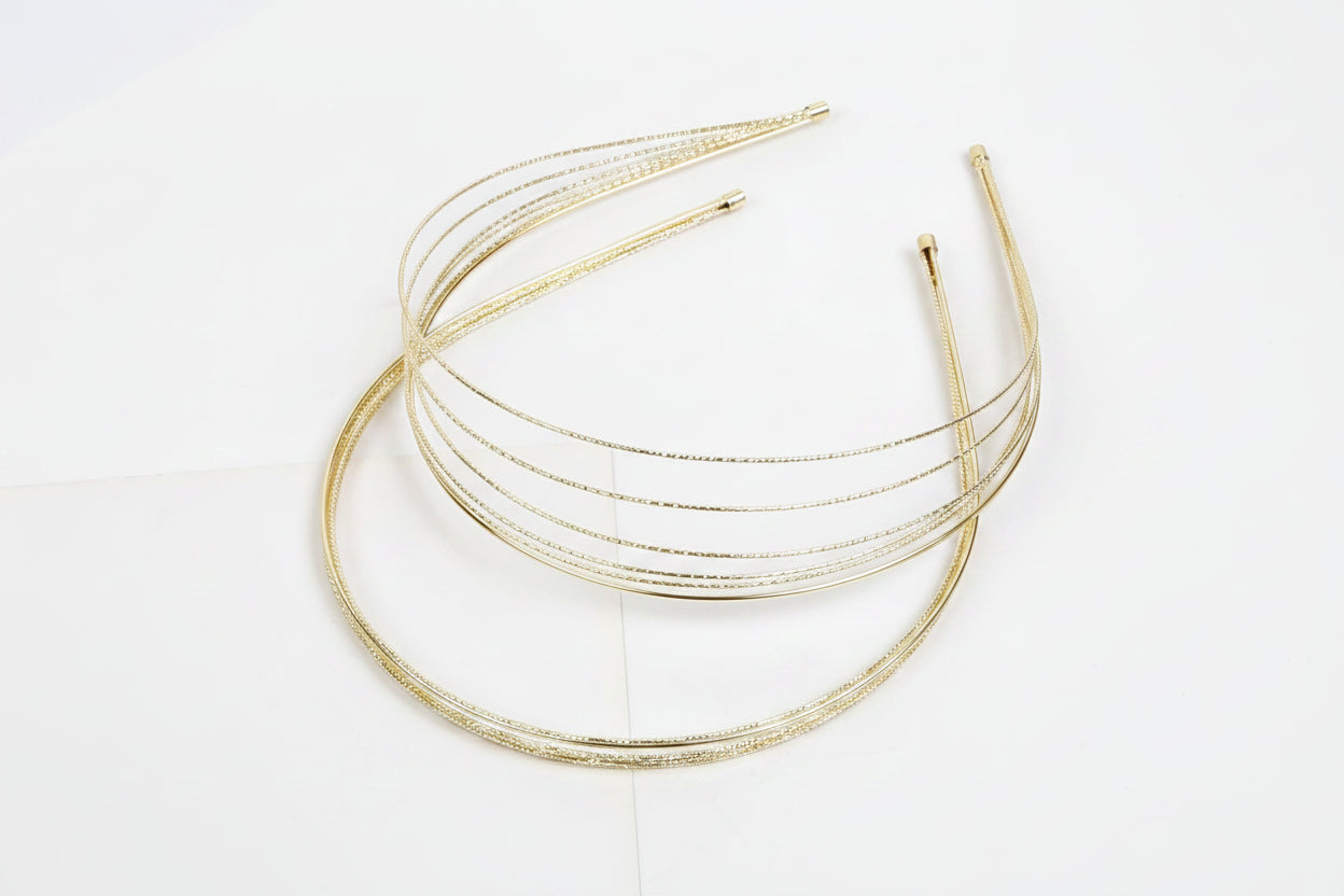 Gold headband on a white background