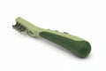 Green and silver tool with a handle on a white background
