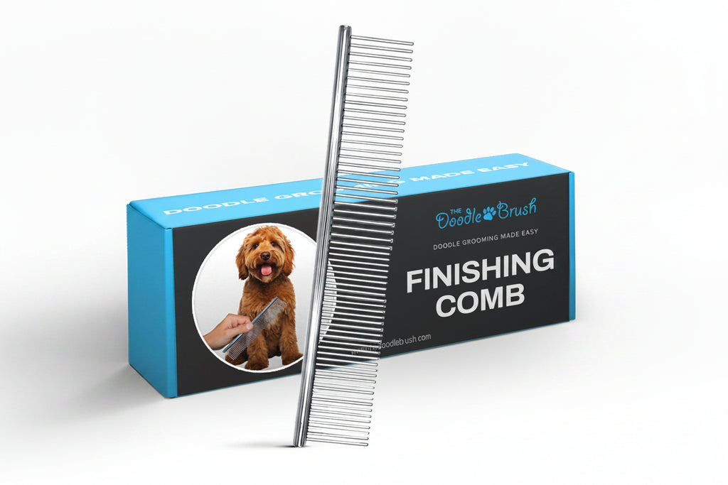 Dog grooming comb with 'The Doodle Brush' packaging on a white background