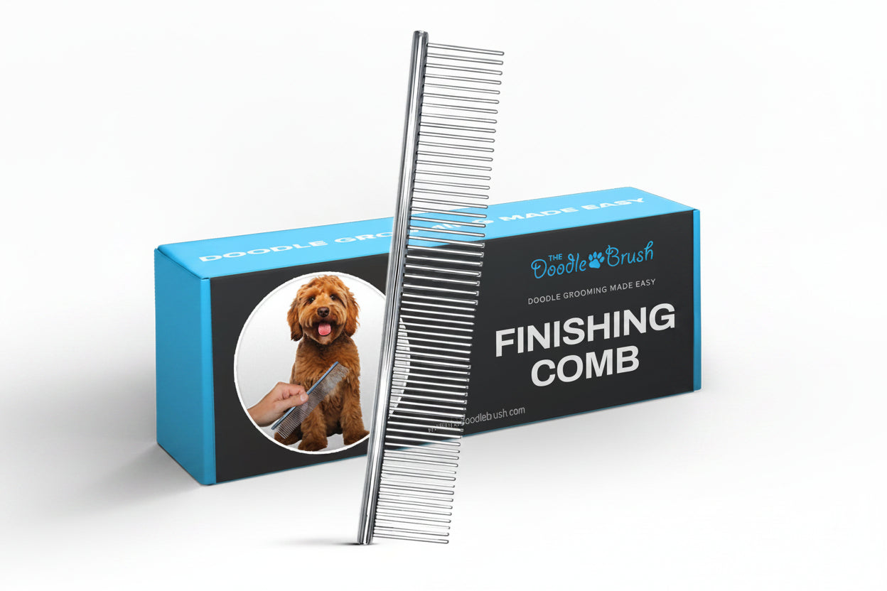 Dog grooming comb with 'The Doodle Brush' packaging on a white background