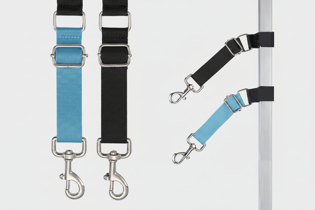Three straps in blue, black, and a mix of both, attached to metal hooks on a white background.