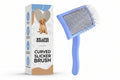 Pet grooming brush with blue handle and clear bristle side, next to its packaging labeled 'We Love Doodles'.