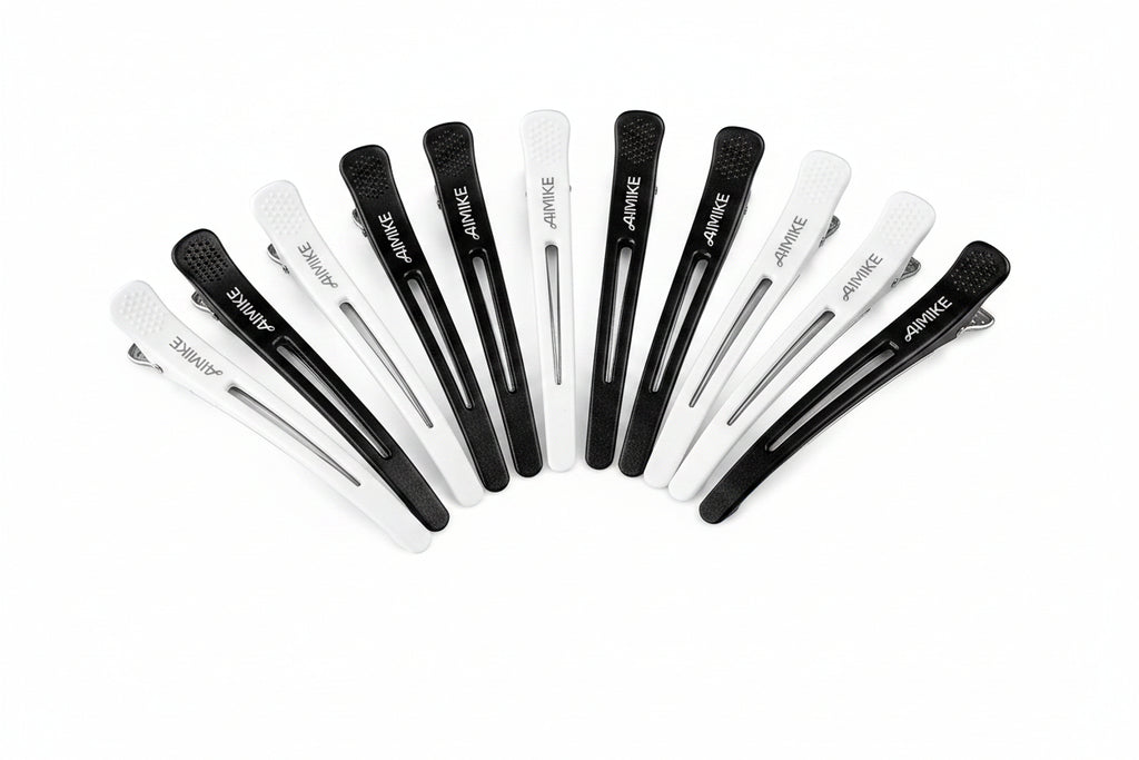 Set of black and white tweezers with 'AIMIKE' branding on a white background