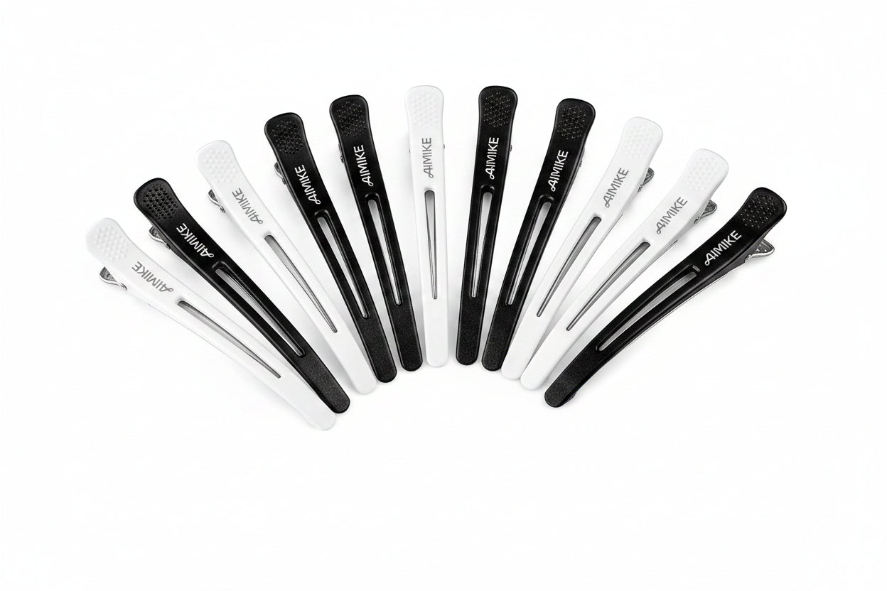 Set of black and white tweezers with 'AIMIKE' branding on a white background