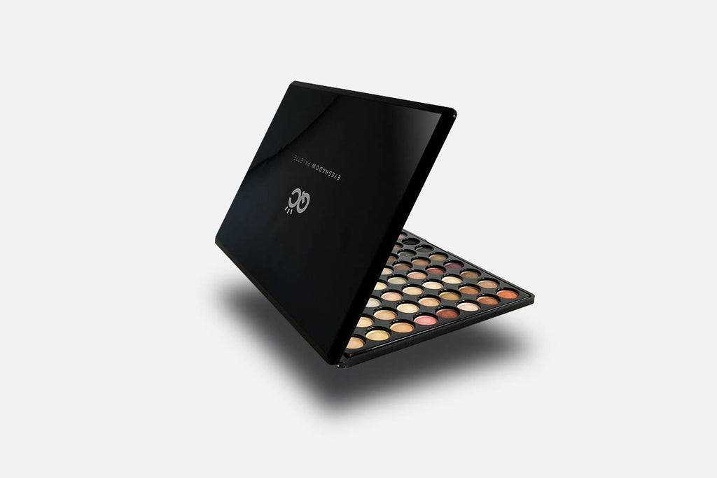 Makeup palette with visible color swatches on a white background