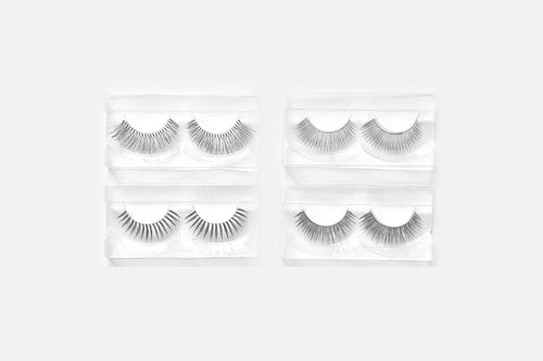 Set of false eyelashes in clear packaging on a white background