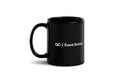 Black mug that reads "QC Event School"