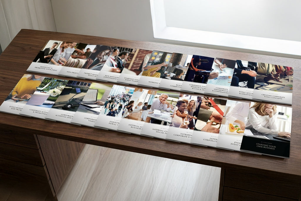 Long table with multiple educational booklets.