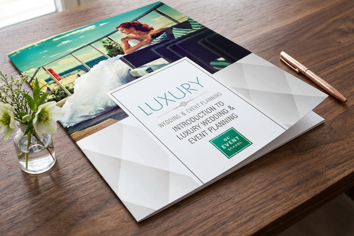 Booklet titled 'Luxury Wedding & Event Planning' on a wooden surface with a pen and vase.