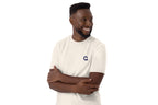 Man wearing a white t-shirt with a QC logo on a white background