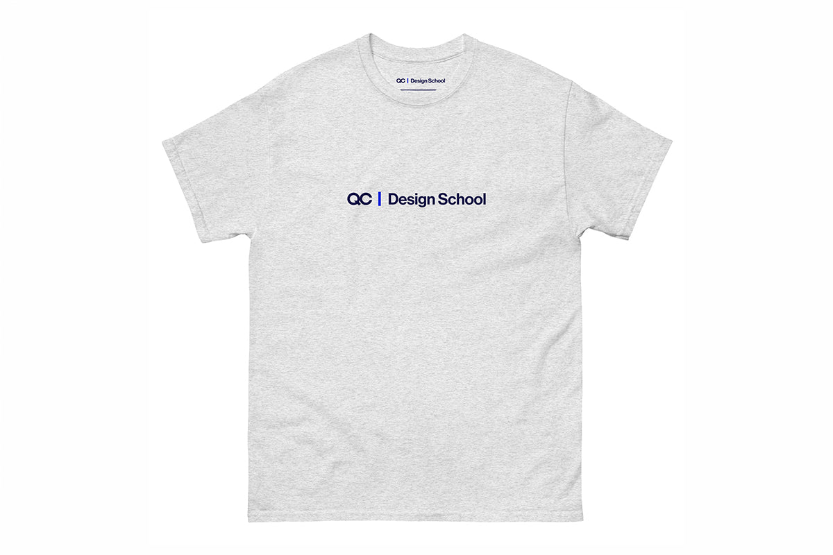 Gray t-shirt with 'QC Design School' logo on a white background