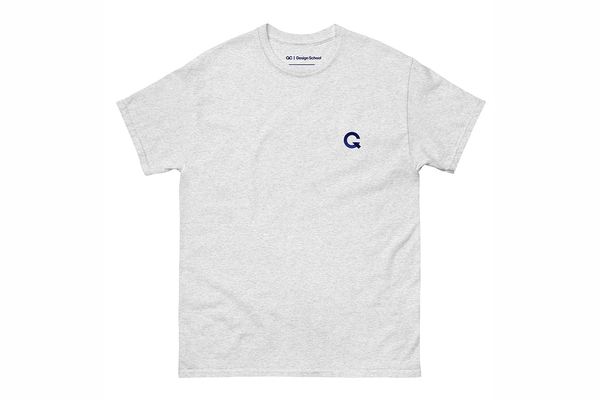 Gray t-shirt with a small Q logo on the chest against a white background
