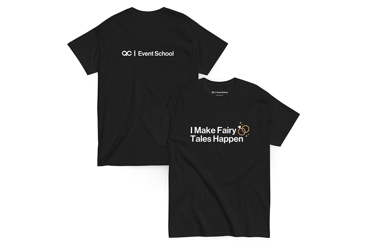 Black t-shirt with text 'I Make Fairy Tales Happen' on a white background. Back of t-shirt reads "QC Event School".