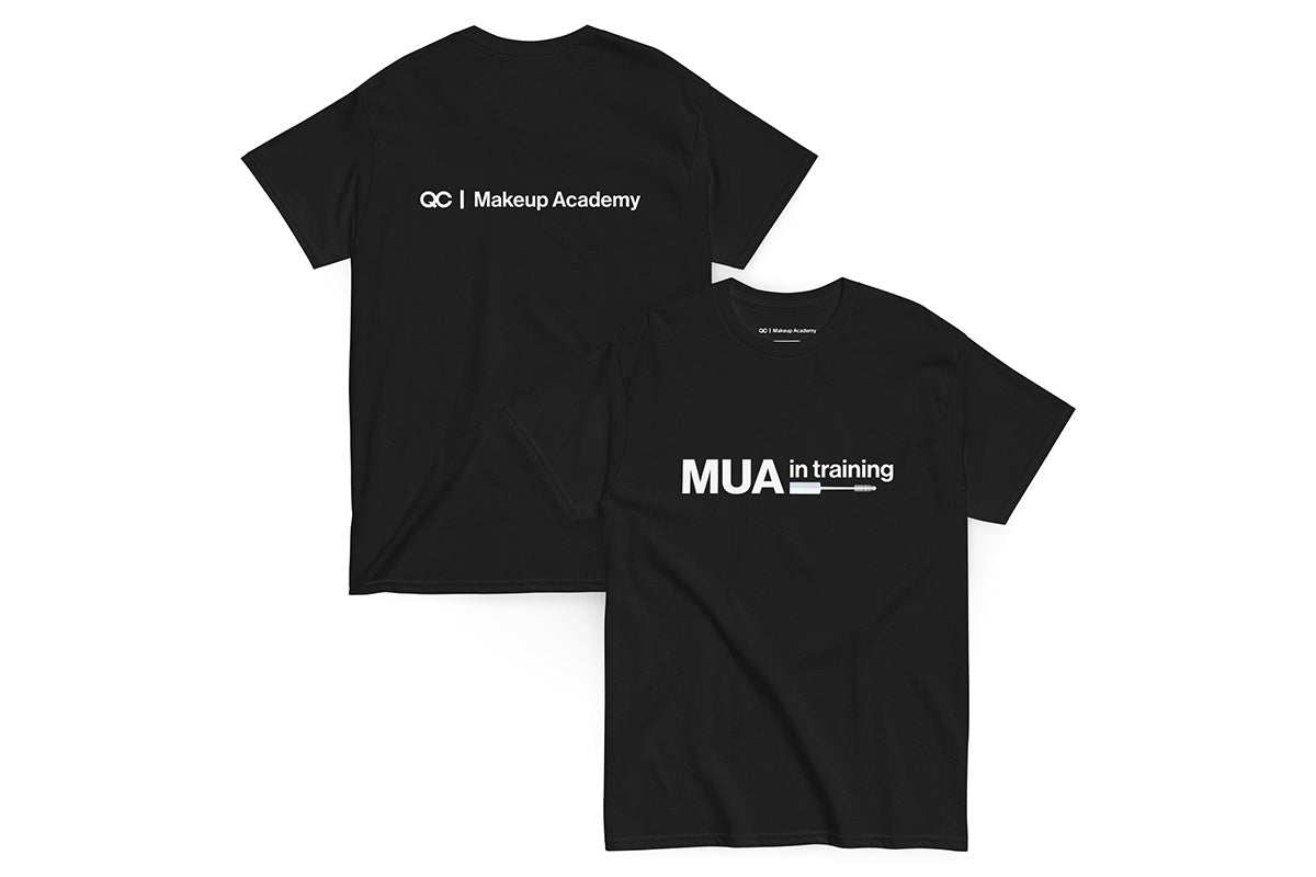 Black t-shirt with text 'MUA in Training' on a white background. Back of t-shirt reads "QC Makeup Academy".