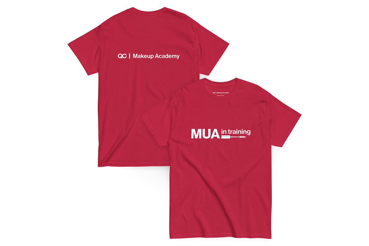 Red t-shirt with text 'MUA in Training' on a white background. Back of t-shirt reads "QC Makeup Academy".