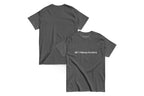 Front and back of a grey t shirt. The front reads "QC Makeup Academy"