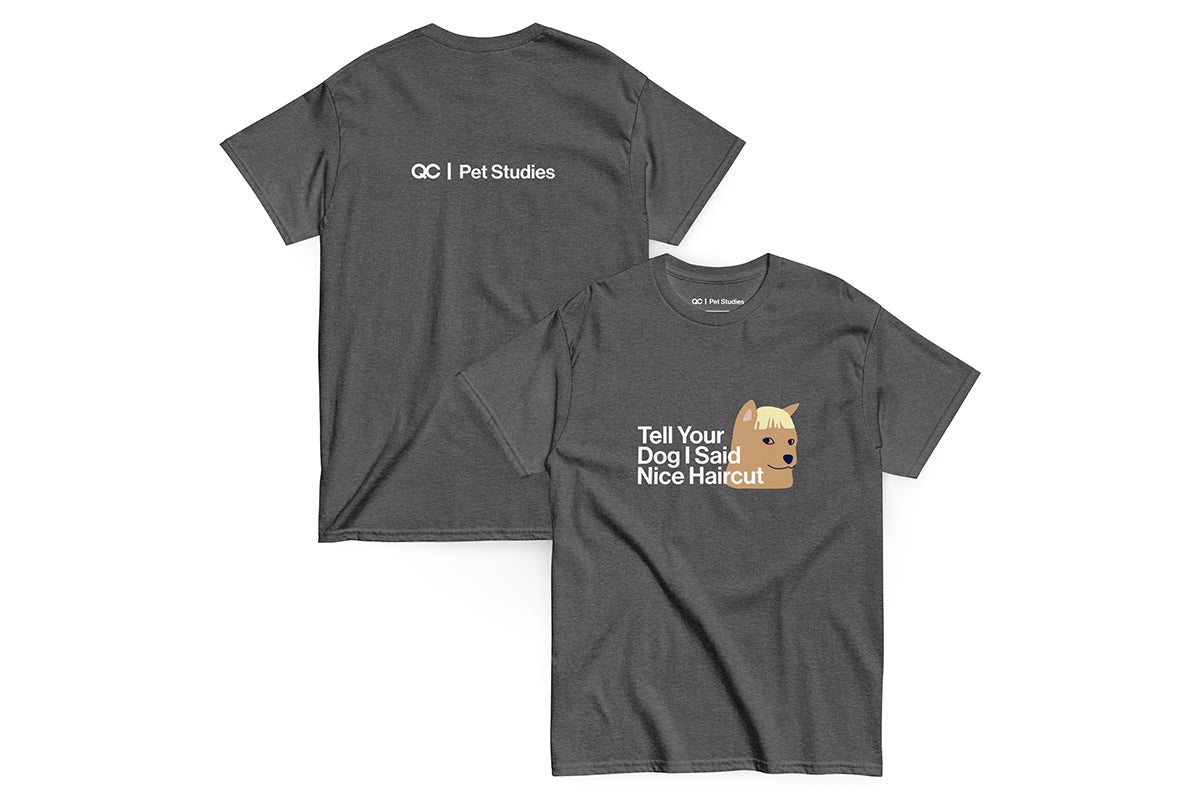 Gray t-shirt with text that reads "Tell Your Dog I Said Nice Haircut" and a dog graphic on a white background