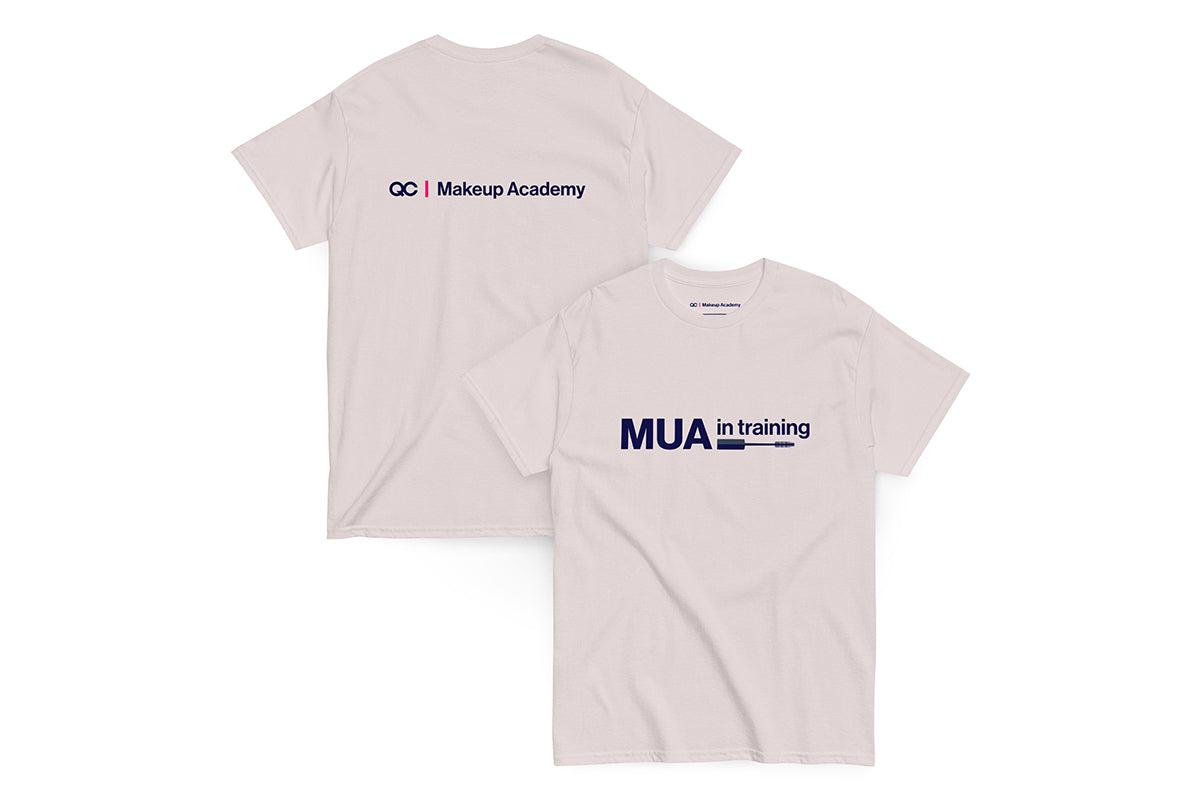 Back and front of beige t-shirt. Back reads "QC Makeup Academy", front reads "MUA in Training"