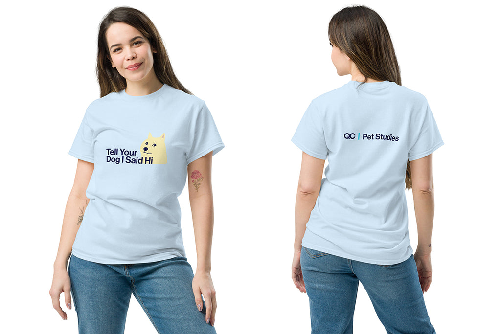 Person wearing a blue t-shirt with text and a QC Pet Studies logo, showing front and back views.