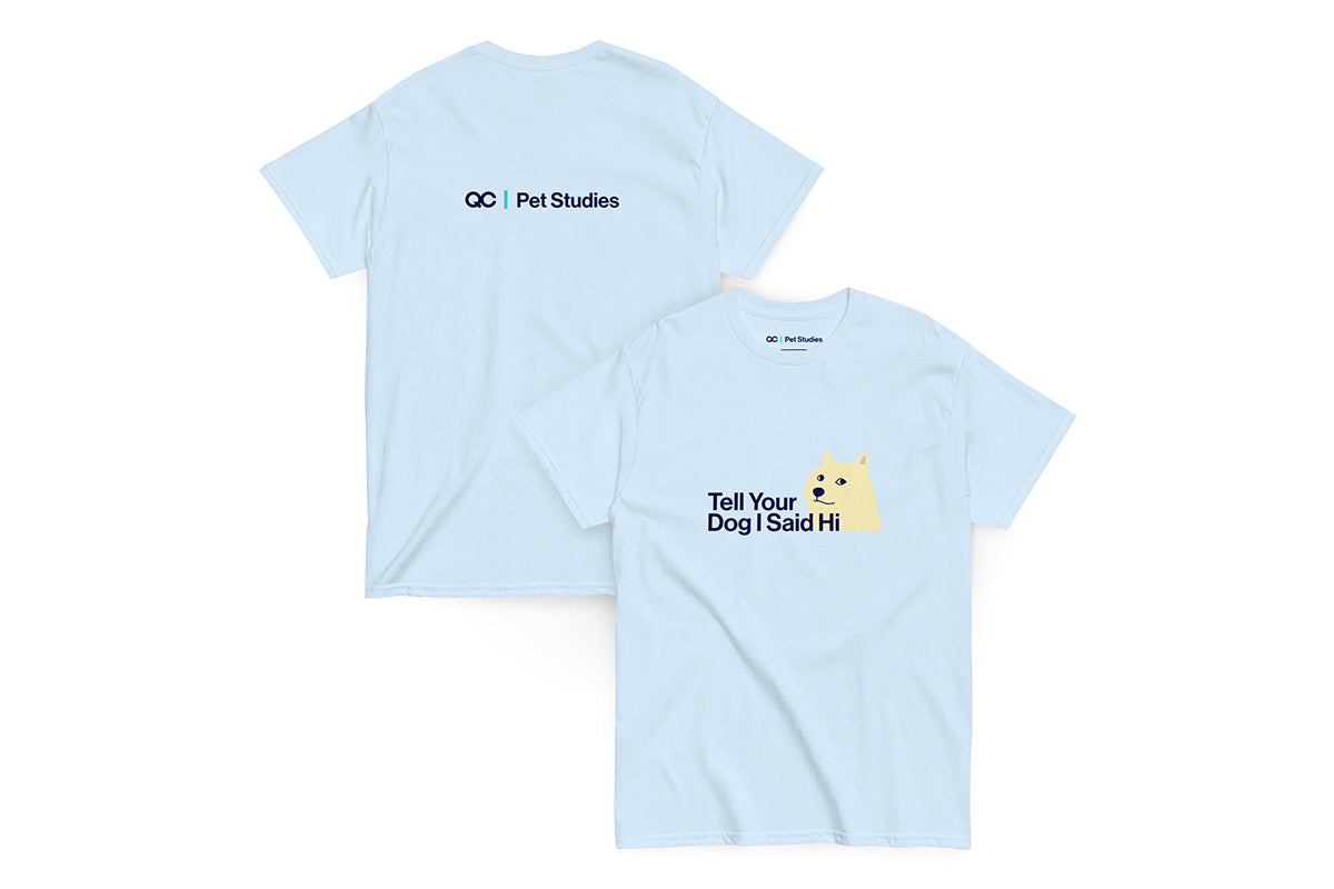 Front and back of blue t-shirt. Text on front reads "Tell Your Dog I Say Hi". Text on back reads "QC Pet Studies"