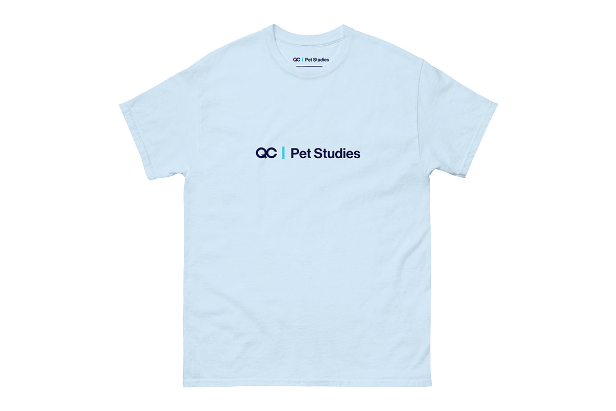 Light blue t-shirt with 'QC Pet Studies' text on a white background