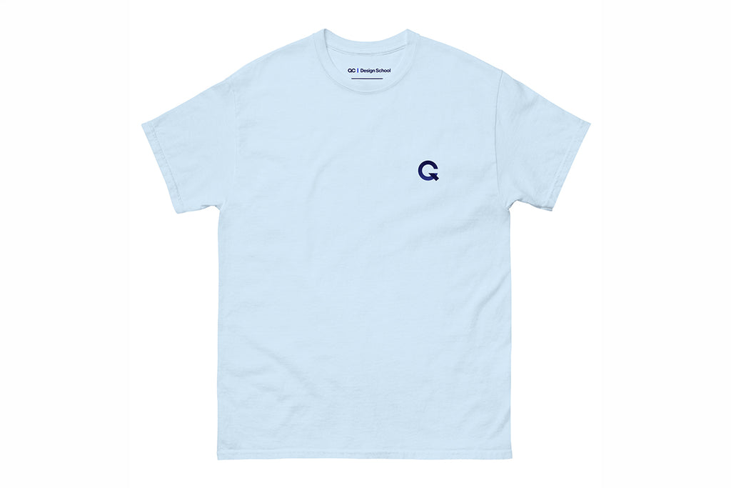Light blue t-shirt with a small Q logo on a white background