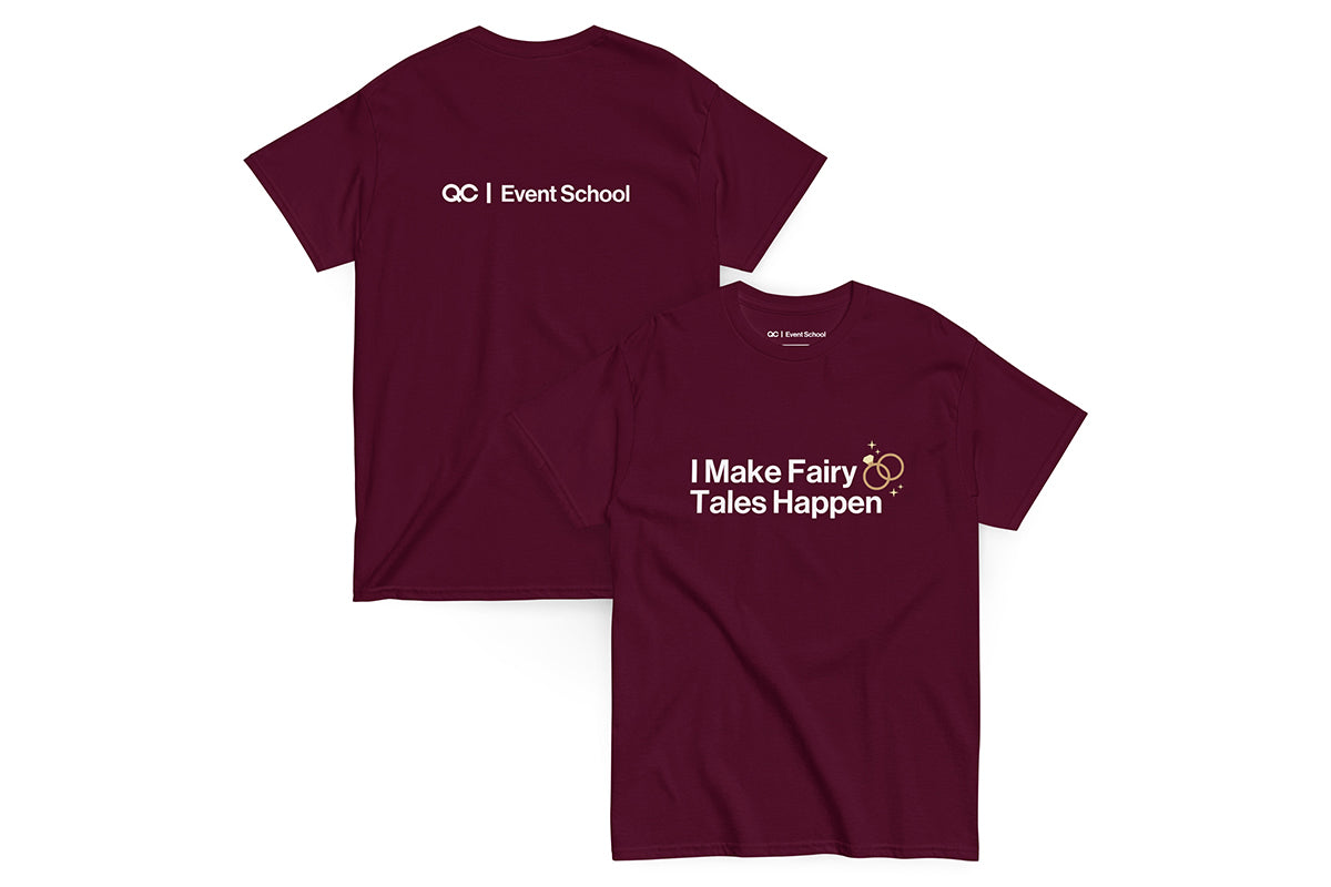 Maroon t-shirt with text 'I Make Fairy Tales Happen' on a white background. Back of t-shirt reads "QC Event School".