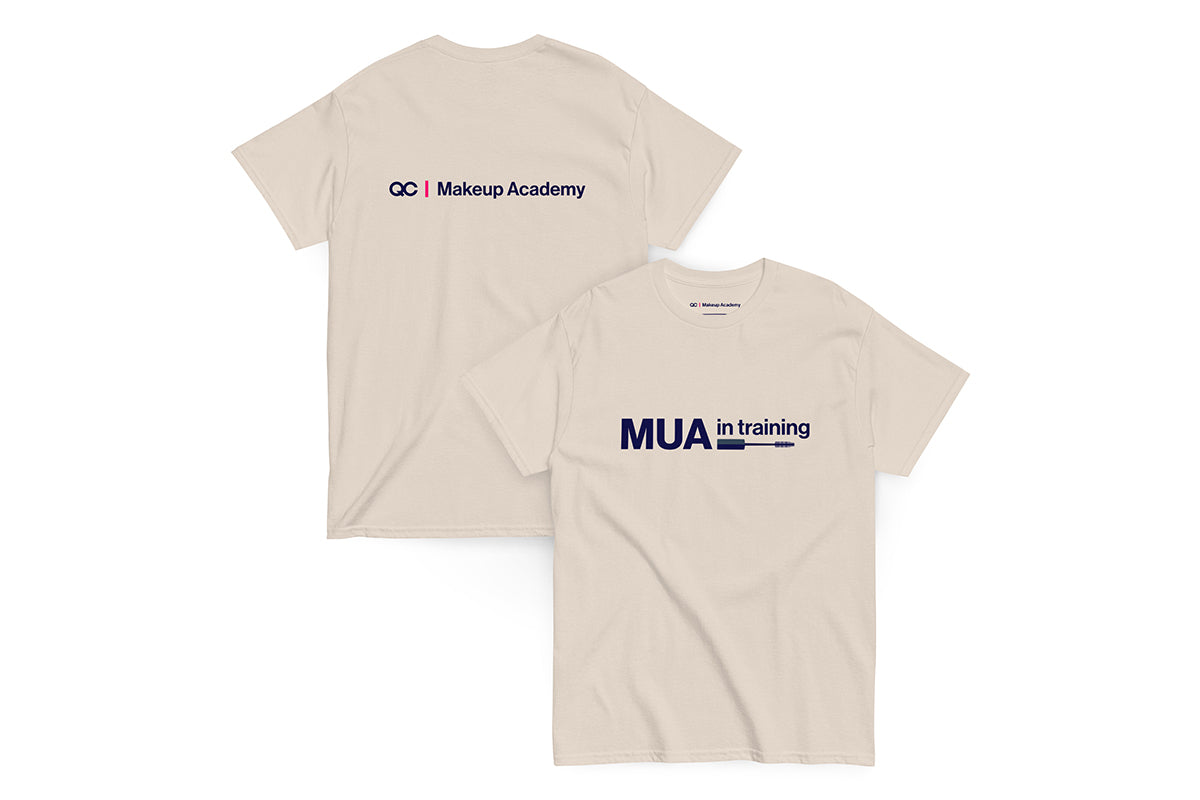 Back and front of beige t-shirt. Back reads "QC Makeup Academy", front reads "MUA in Training"