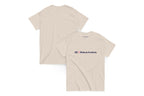 Back and front of Beige t-shirt with 'QC Makeup Academy' logo on a white background