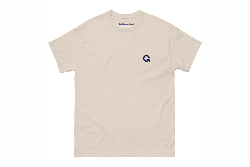 Beige t-shirt with a small Q logo on a white background