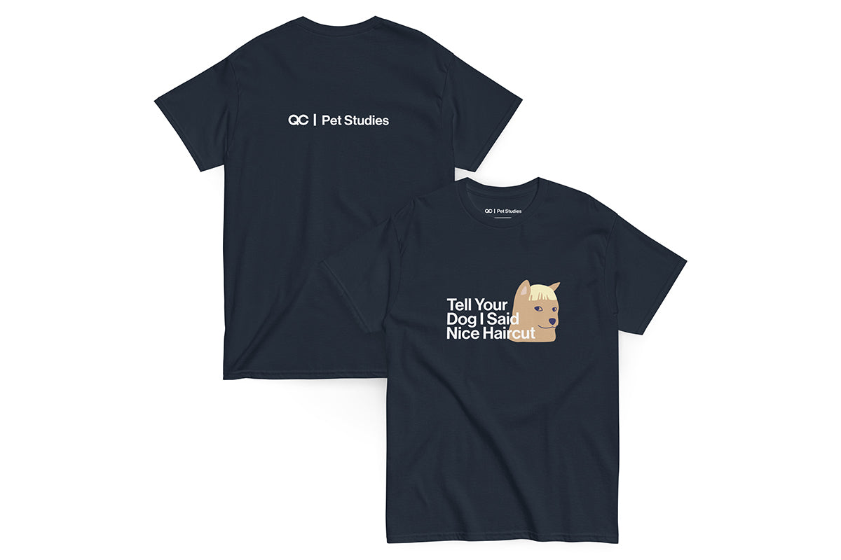 Navy blue t-shirt with text that reads "Tell Your Dog I Said Nice Haircut" and a dog graphic on a white background