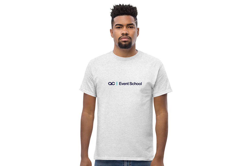 Man wearing a white t-shirt with 'QC Event School' logo on a white background