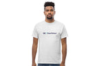 Man wearing a white t-shirt with 'QC Event School' logo on a white background