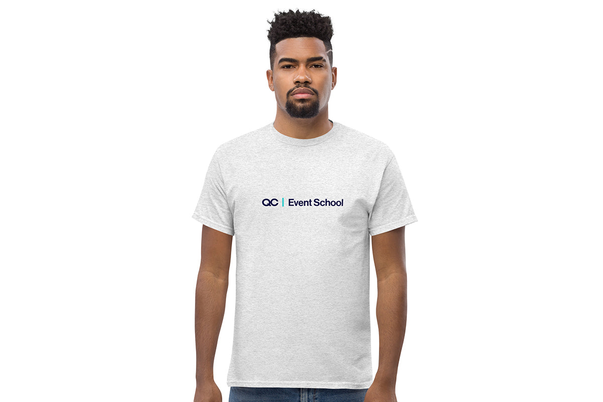 Man wearing a white t-shirt with 'QC Event School' logo on a white background