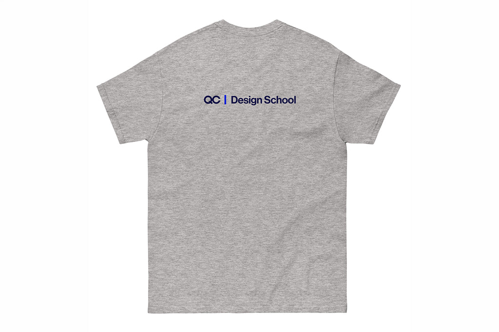 Gray t-shirt with a QC Design School logo against a white background