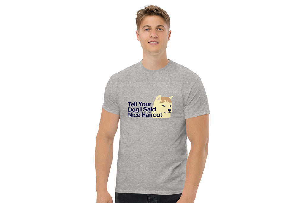 Man wearing a gray t-shirt with a graphic and text on a white background