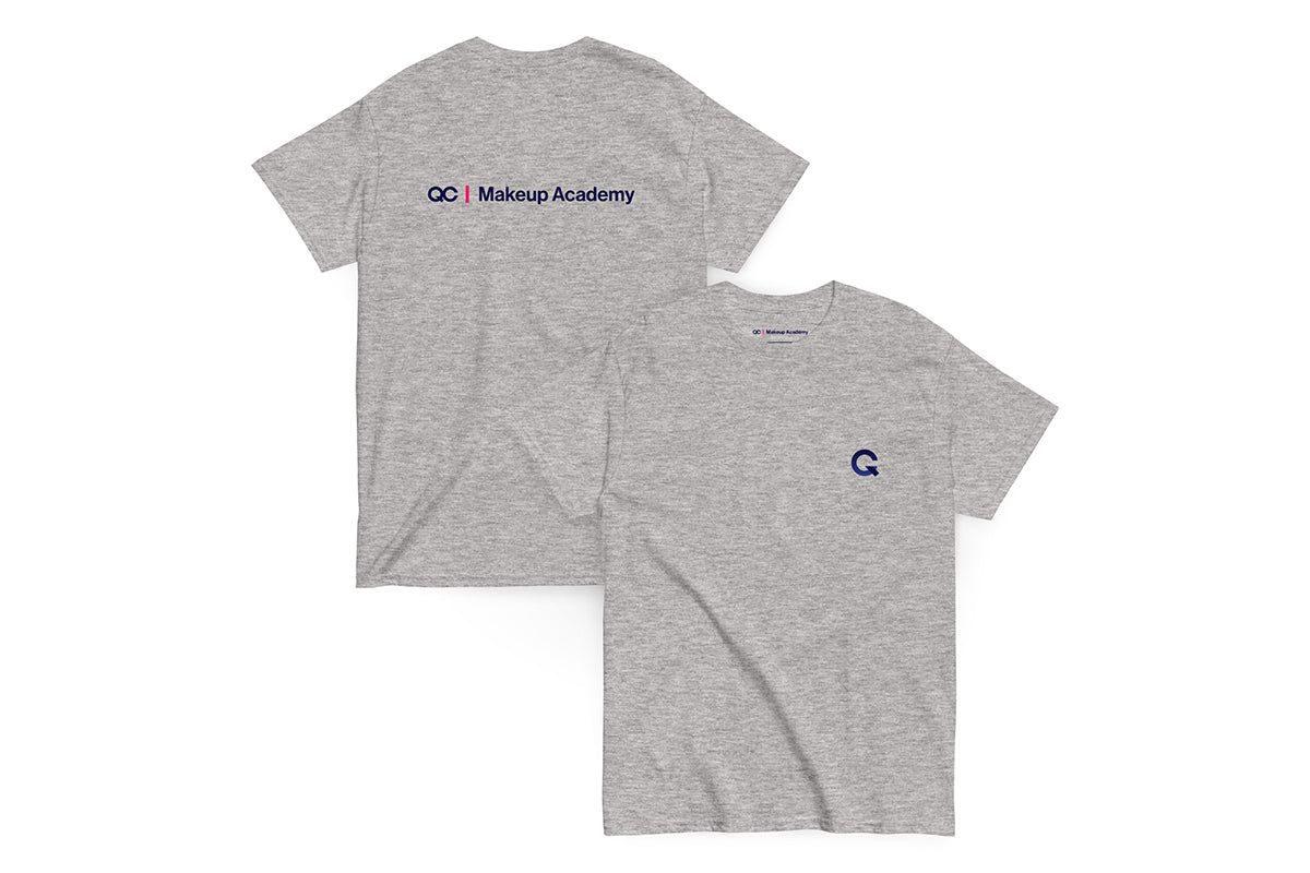 Back and front of gray t shirt. Back reads "QC Makeup Academy", front features Q logo.
