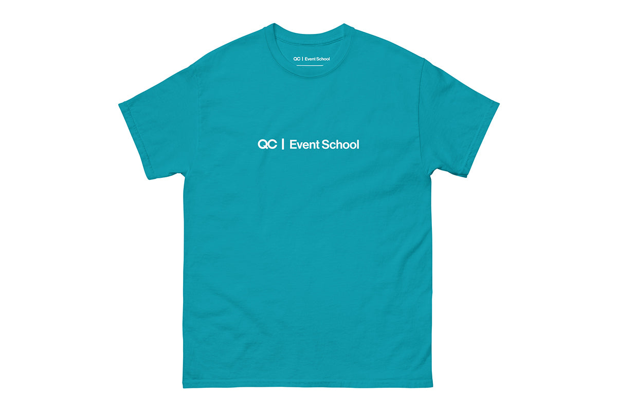 Blue t-shirt with 'QC Event School' text on a white background