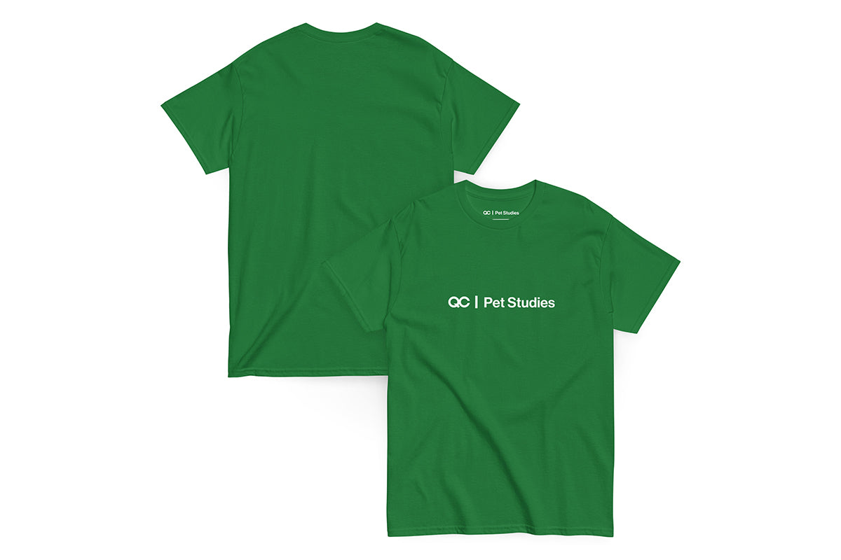 Green t-shirt with 'QC Pet Studies' text on a white background