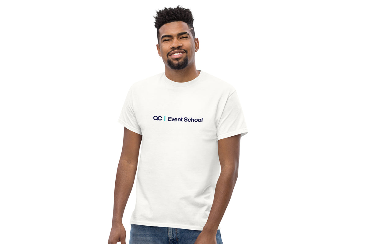 Man wearing a white t-shirt with 'QC Event School' logo on a white background