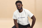 Man wearing a white t-shirt with 'OC Design School' text on a beige background