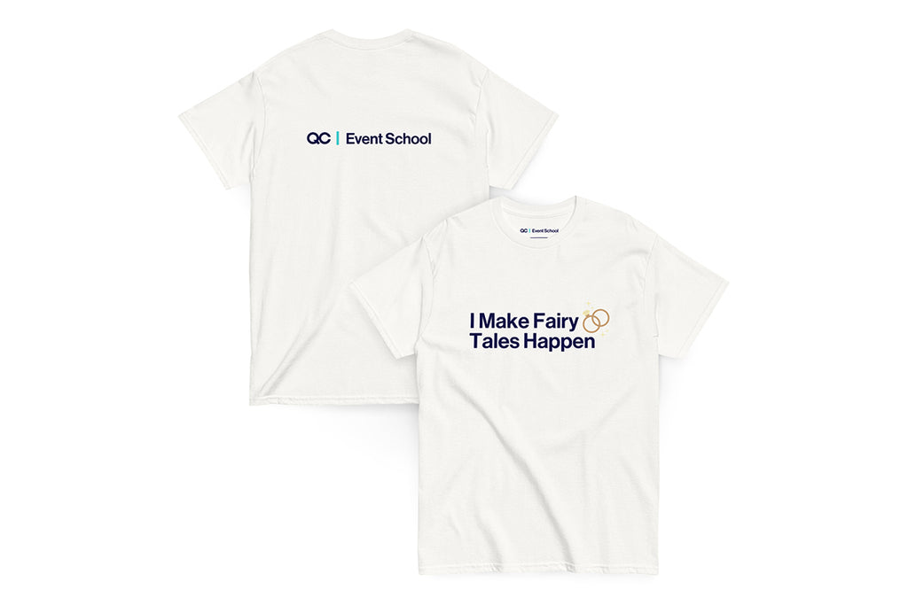 Back and front of white t-shirt. Back reads "QC Event School". Front reads "I Make Fairy Tales Happen"
