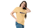 Woman wearing a yellow t-shirt with 'MUA in training' text on a white background