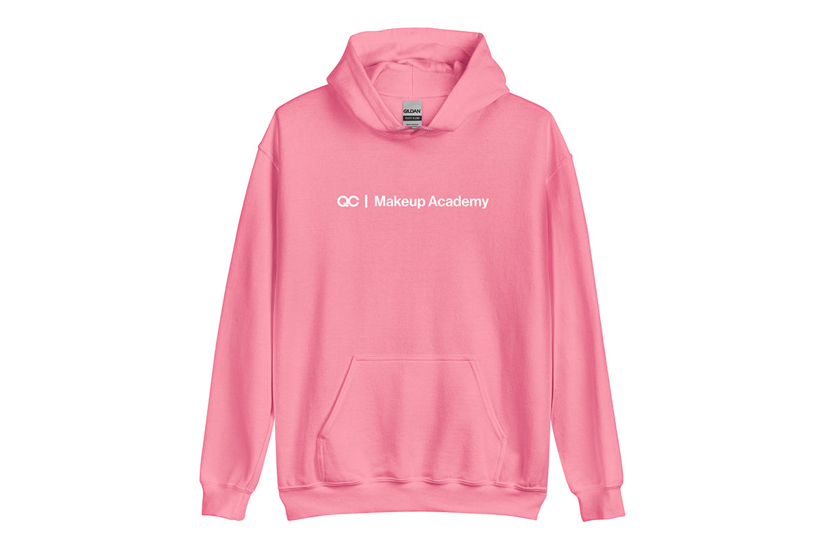 Pink hoodie with 'QC Makeup Academy' text on a white background