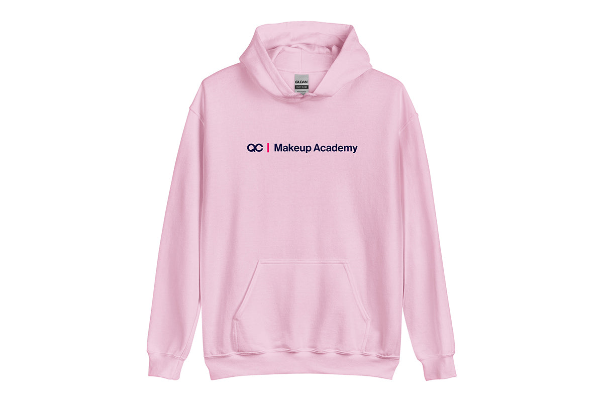 Pink hoodie with 'QC Makeup Academy' text on a white background